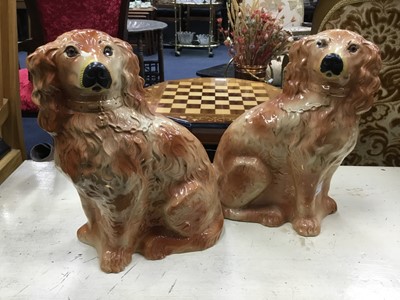 Lot 600 - A PAIR OF 19TH CENTURY WALLY DOGS