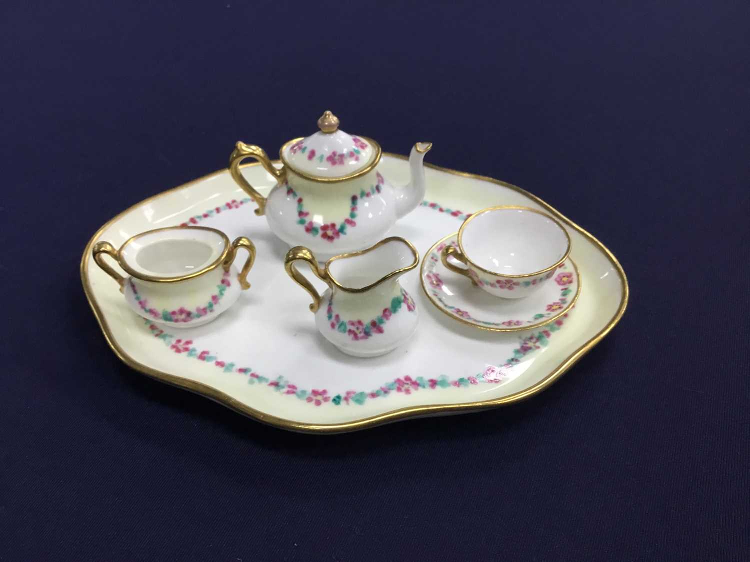 Lot 57 - A CROWN STAFFORDSHIRE MINIATURE TEA SET, ALONG WITH OTHER CERAMICS