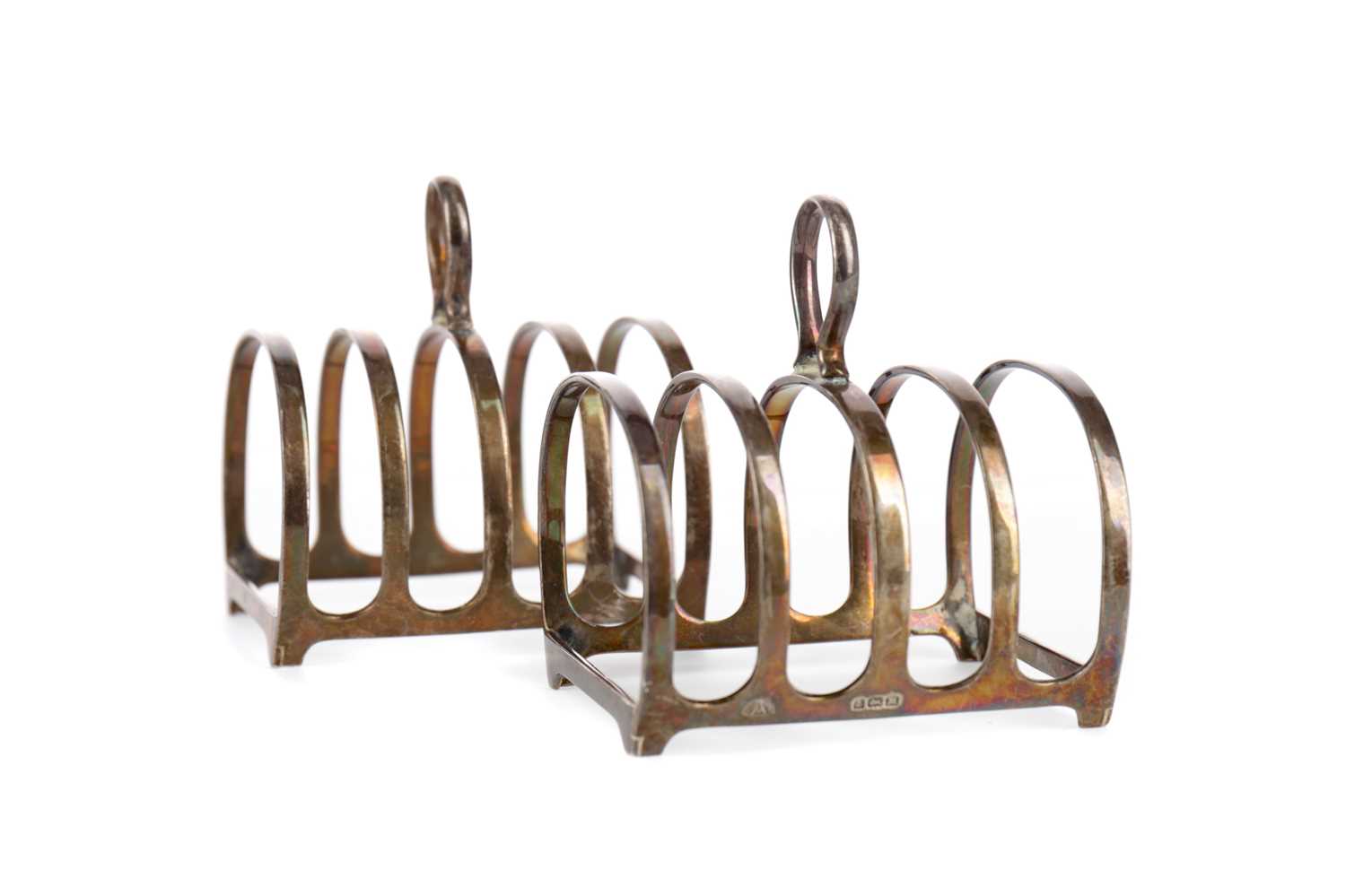 Lot 475 - A PAIR OF SILVER TOAST RACKS