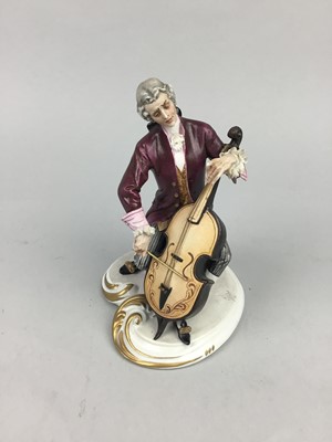 Lot 105 - A CAPODIMONTE FIGURE OF A CELLIST AND A GROUP OF HUMMEL FIGURES