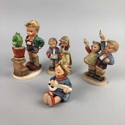 Lot 105 - A CAPODIMONTE FIGURE OF A CELLIST AND A GROUP OF HUMMEL FIGURES