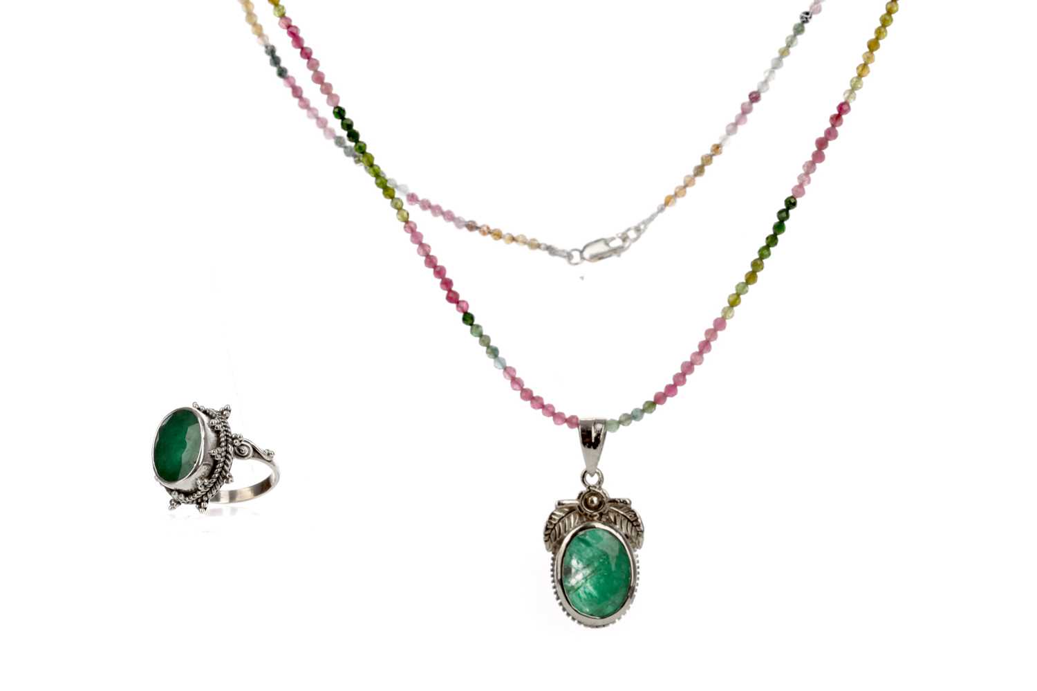 Lot 427 - A TOURMALINE BEAD NECKLACE, EMERALD RING AND PENDANT