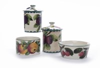 Lot 1127 - TWO WEMYSS WARE POTS WITH COVERS both...