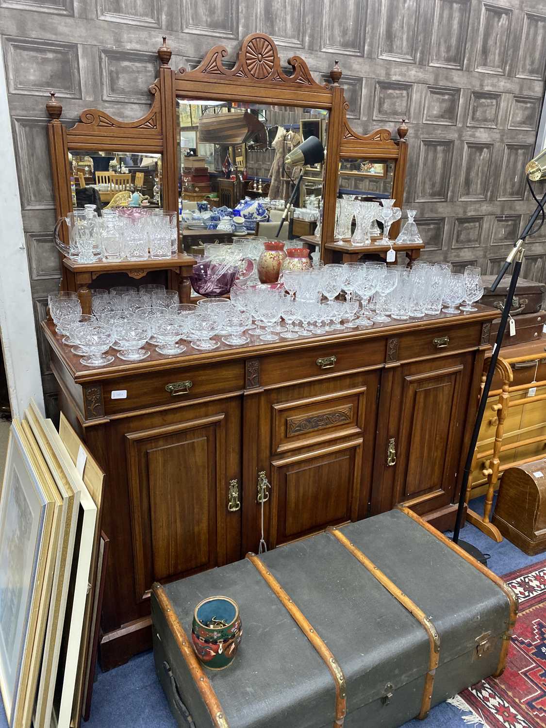 Lot 140 - A STAINED WOOD MIRROR BACKED SIDEBOARD