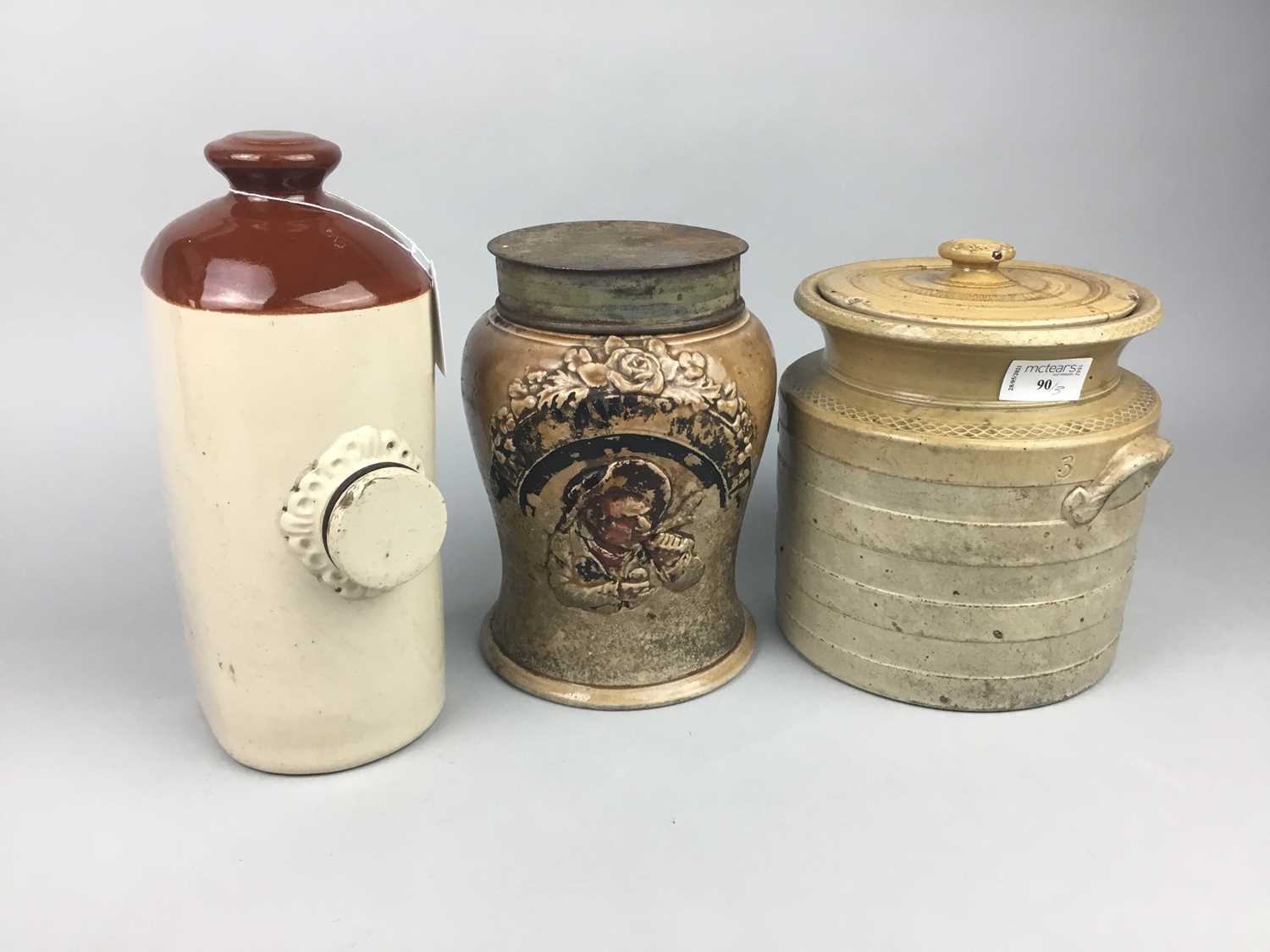 Lot 90 - A STONEWARE HOT WATER BOTTLE AND TWO OTHERS