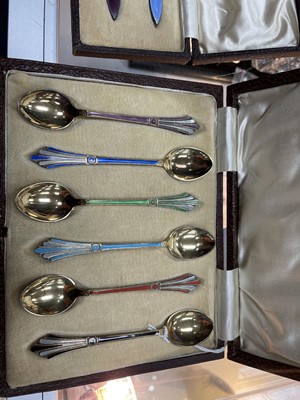 Lot 66 - A SET OF SIX ENAMELLED SILVER GILT TEA SPOONS AND ANOTHER
