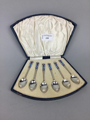 Lot 199 - A SET OF SIX SILVER AND ENAMEL TEA SPOONS