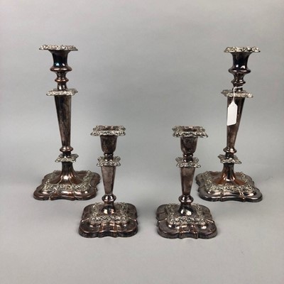 Lot 216 - A LOT OF TWO PAIRS OF VICTORIAN SHEFFIELD PLATE TABLE CANDLESTICKS