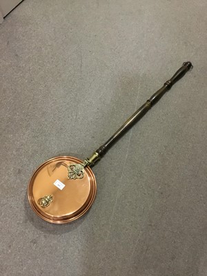 Lot 163 - A BRASS AND COPPER BED WARMING PAN AND FOUR WALKING STICKS