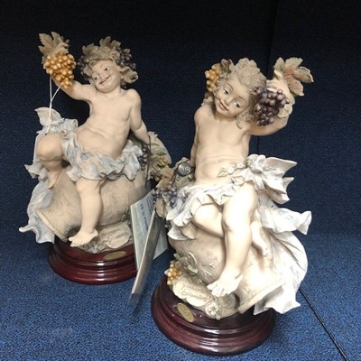 Lot 143 - A FLORENCE FIGURE OF A SEATED CHILD AND TWO OTHERS