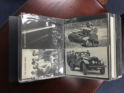 Lot 214 - A LOT OF TWO ALBUMS OF VINTAGE MILITARY POSTCARDS