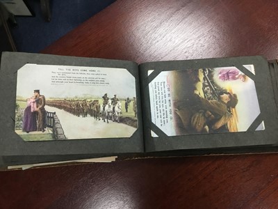 Lot 214 - A LOT OF TWO ALBUMS OF VINTAGE MILITARY POSTCARDS