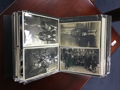 Lot 214 - A LOT OF TWO ALBUMS OF VINTAGE MILITARY POSTCARDS