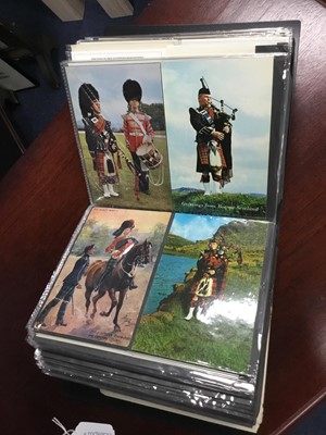 Lot 214 - A LOT OF TWO ALBUMS OF VINTAGE MILITARY POSTCARDS