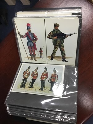 Lot 214 - A LOT OF TWO ALBUMS OF VINTAGE MILITARY POSTCARDS
