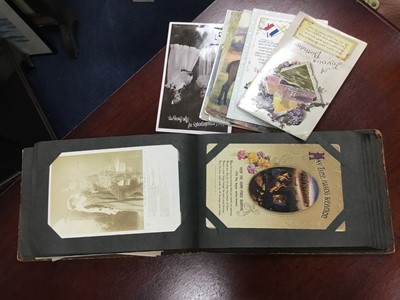 Lot 214 - A LOT OF TWO ALBUMS OF VINTAGE MILITARY POSTCARDS