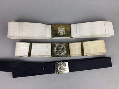 Lot 26 - A MILITARY BELT WITH GORDON HIGHLANDERS CLASP AND OTHERS