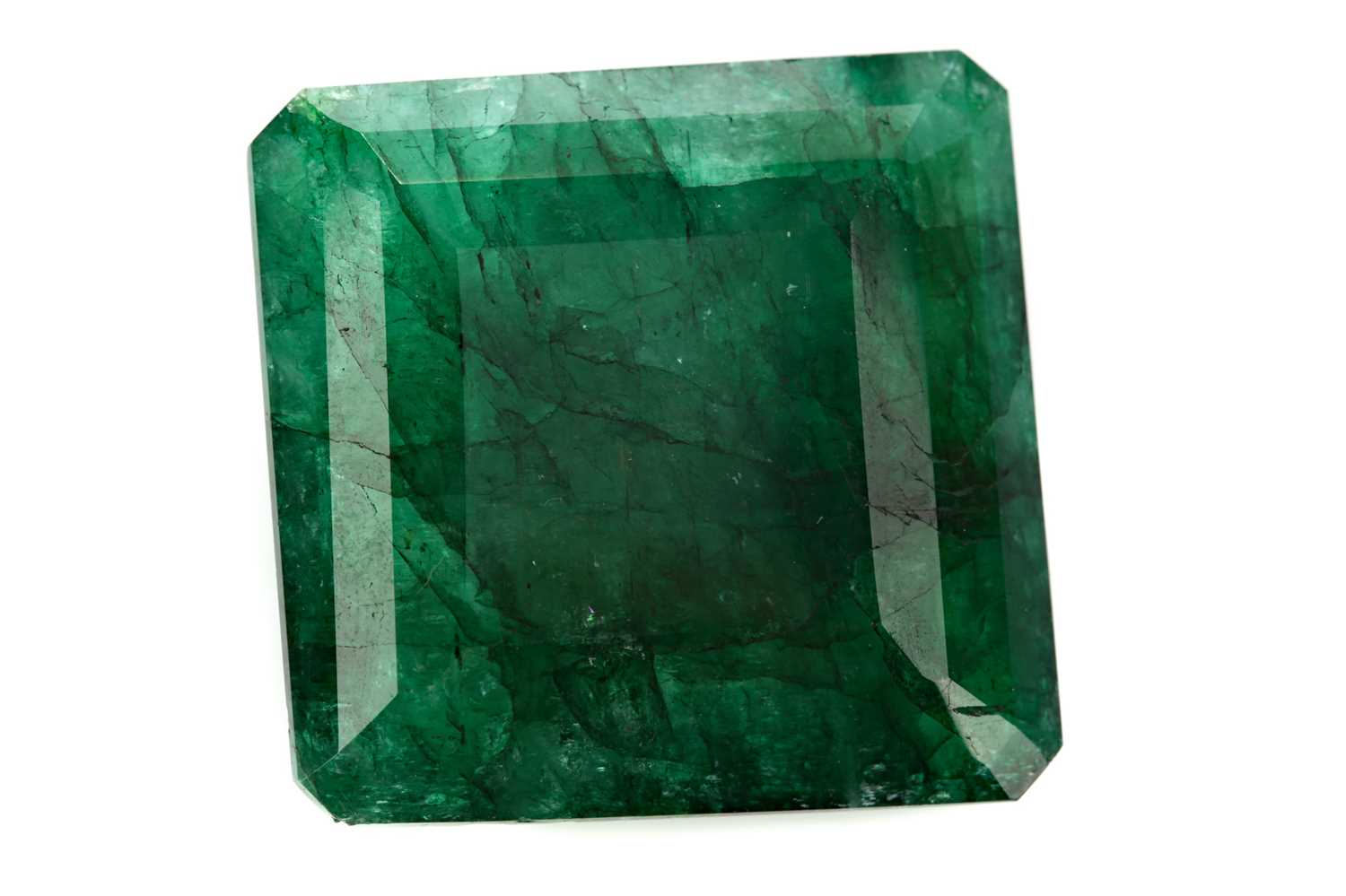 Lot 429 - **A CERTIFICATED UNMOUNTED EMERALD