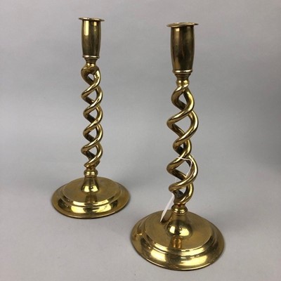 Lot 218 - A PAIR OF BRASS CANDLESTICKS