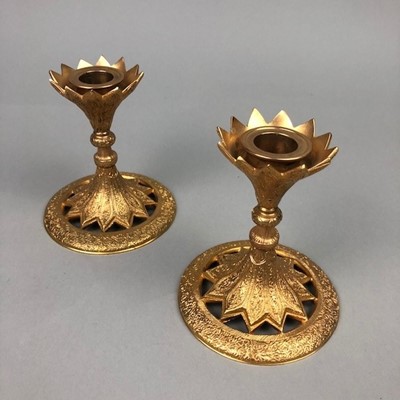 Lot 219 - A PAIR OF GILT METAL CANDLESTICKS