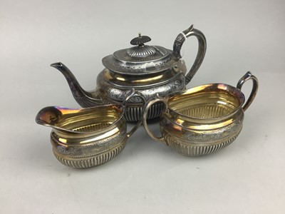 Lot 272 - A LATE VICTORIAN SILVER PLATED THREE PIECE TEA SERVICE AND CASED SERVALLS