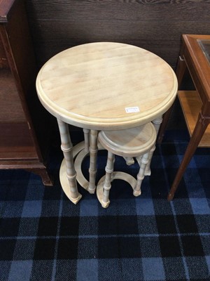 Lot 327 - AN OAK BOOKSHELF AND TWO NESTS OF TABLES