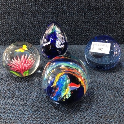 Lot 282 - A LOT OF FOUR GLASS PAPERWEIGHTS AND THREE COMPOSITION FIGURES