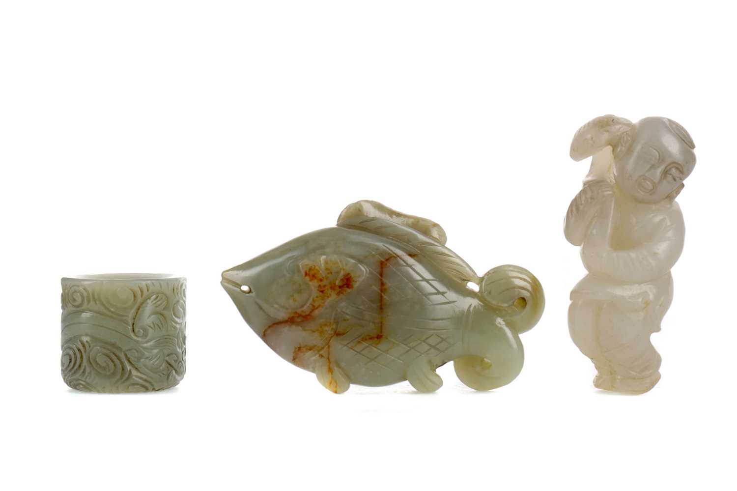 Lot 836 - A 20TH CENTURY CHINESE JADE ARCHER'S RING, FISH AND MALE CARVINGS