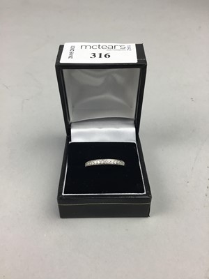 Lot 316 - A DIAMOND HALF ETERNITY RING