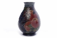 Lot 1186 - MODERN MOORCROFT VASE decorated with apples,...