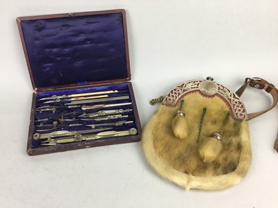 Lot 363 - A SPORRAN, ALONG WITH A DRAWING SET, BOOK AND DOLL