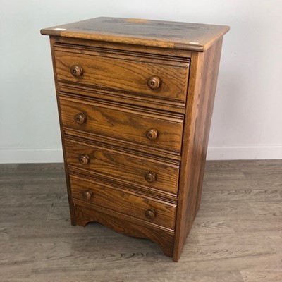 Lot 414 - A OAK CHEST OF FOUR DRAWERS