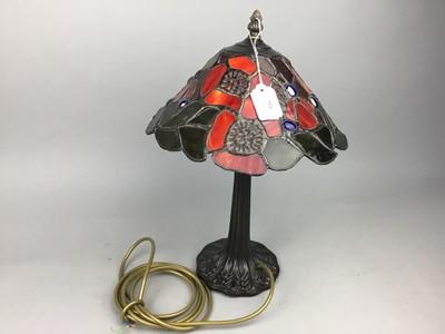 Lot 529 - A TIFFANY STYLE TABLE LAMP, A DARTMOUTH FIGURE OF A HEAD AND A GLASS CENTREPIECE