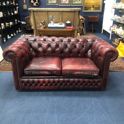 Lot 301 - A RED CHESTERFIELD TWO SEAT SETTEE