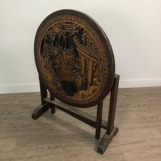 Lot 549 A CHINESE CARVED WOOD FOLDING TABLE