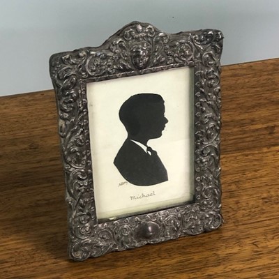 Lot 587 - A SILVER PHOTOGRAPH FRAME