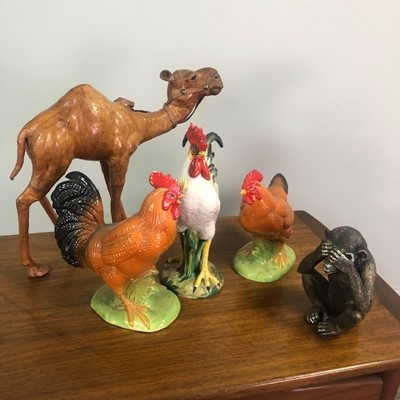 Lot 594 - A LOT OF TWO LEATHER CAMEL FIGURES, TRIO OF 'WISE MONKIES' AND OTHERS