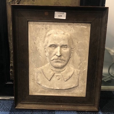 Lot 629 - A FRAMED PLASTER WALL PLAQUE