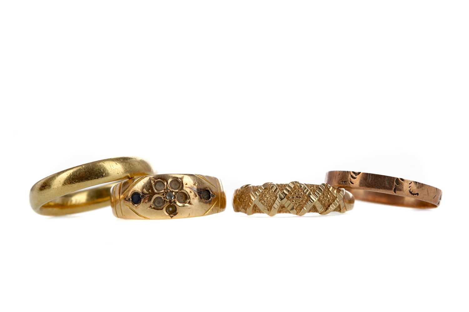 Lot 1313 - FOUR GOLD RINGS