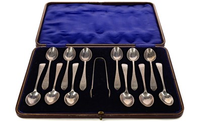 Lot 494 - A CASED SET OF TWELVE EARLY 20TH CENTURY SILVER SPOONS AND TONGS
