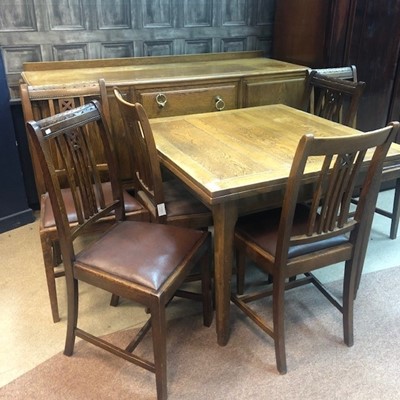 Lot 404A - AN OAK SIDEBOARD, DINING TABLE AND SIX CHAIRS