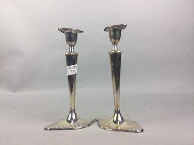 Lot 17 - A PAIR OF SILVER CANDLESTICKS