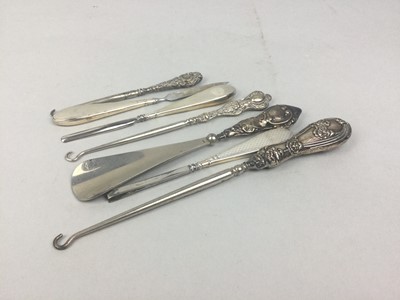 Lot 9 - A LOT OF SILVER HANDLED SEWING TOOLS