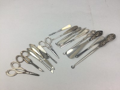 Lot 9 - A LOT OF SILVER HANDLED SEWING TOOLS