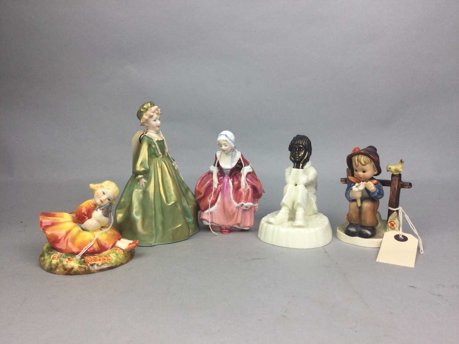 Lot 47 - A ROYAL DOULTON FIGURE OF GOODY TWO SHOES AND TWO OTHER FIGURES