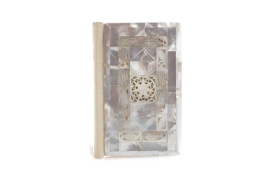 Lot 490 - A MID-20TH CENTURY MOTHER OF PEARL MOUNTED BIBLE