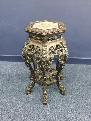 Lot 960 - AN EARLY 20TH CENTURY CHINESE IRONWOOD PLANT TABLE