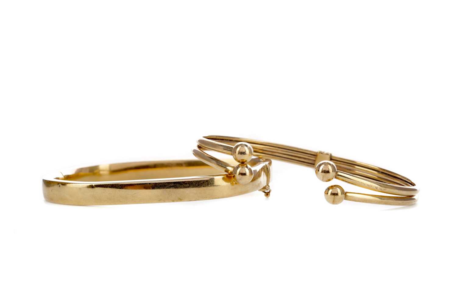Lot 1326 - TWO GOLD BANGLES