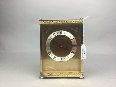 Lot 139 - A TIMEMASTER GILT MANTEL CLOCK AND ANOTHER