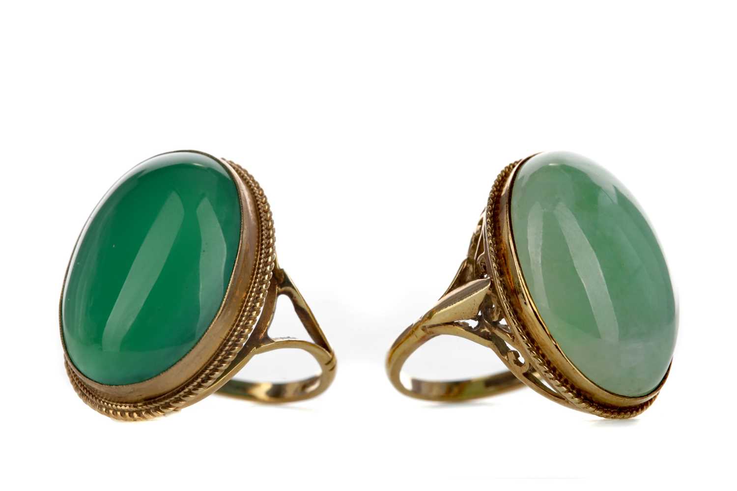 Lot 1352 - TWO GREEN HARDSTONE RINGS
